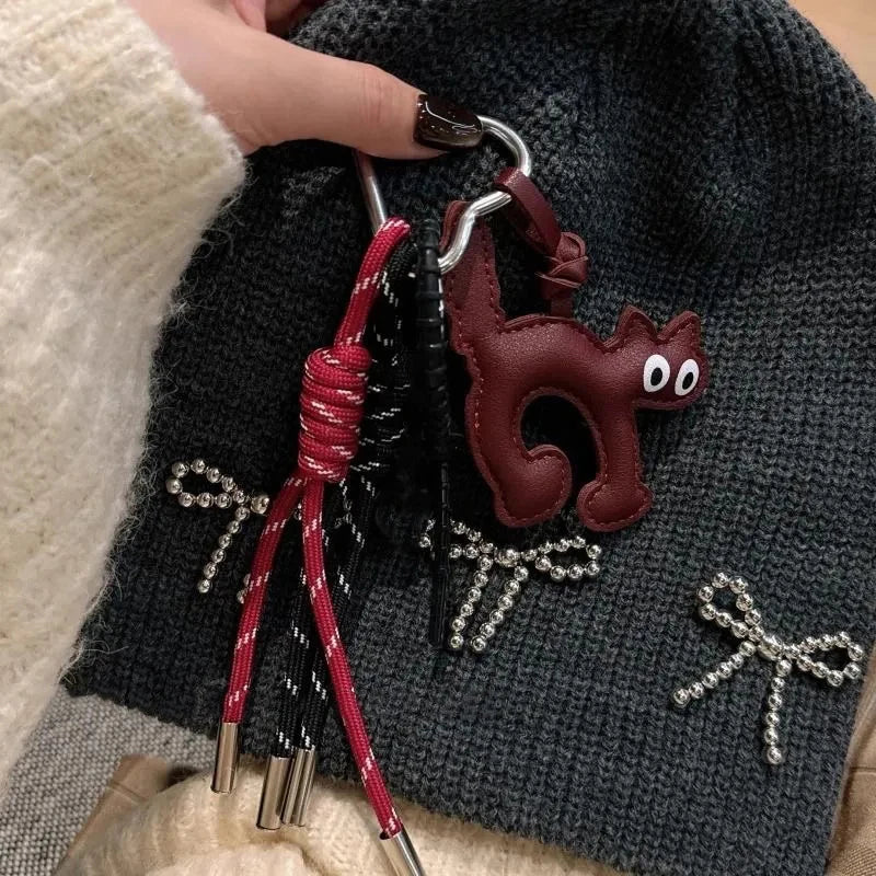 Bag Charm Chat en Cuir